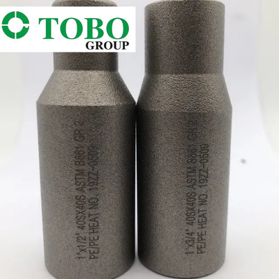 जाली पाइप फिटिंग टाइटेनियम मिश्र धातु इस्पात ASTM B861 GR2 2 '' x 1 '' SCH10S x SCH40S टाइटेनियम मिश्र धातु स्वेज निप्पल